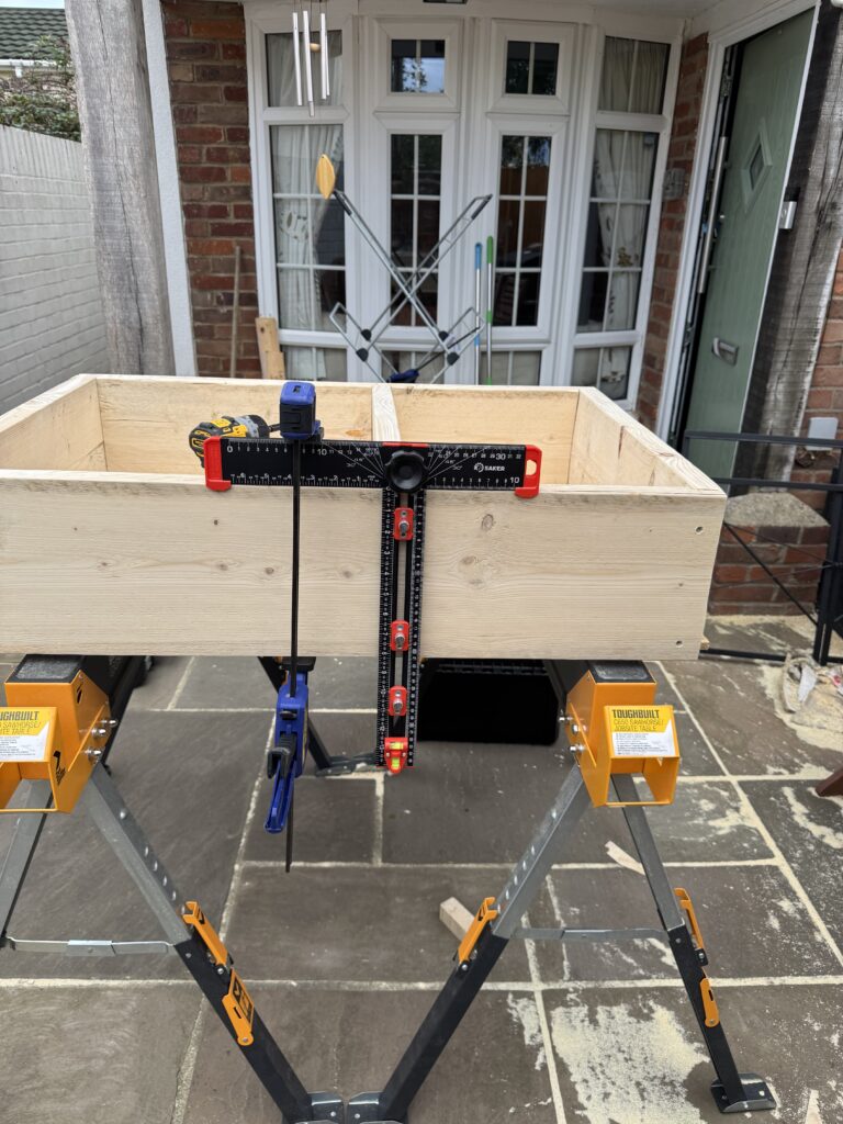 Using the Saker to drill pilots for the middle separator fixings.