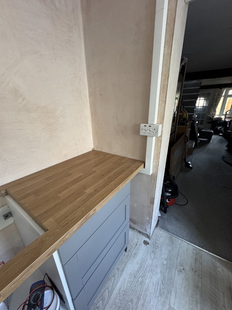 Re-installing the hob and cooker feed